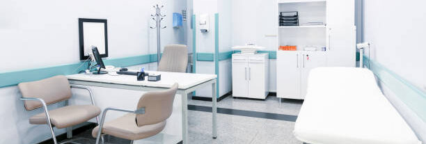 Bright, sterile consultation room designed for patient care, equipment integration, and infection control compliance