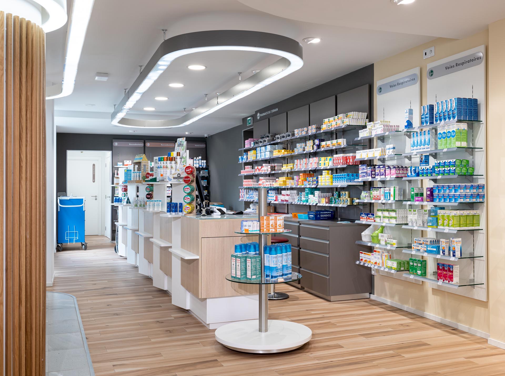 Pharmacy interior renovation with new shelving and lightin