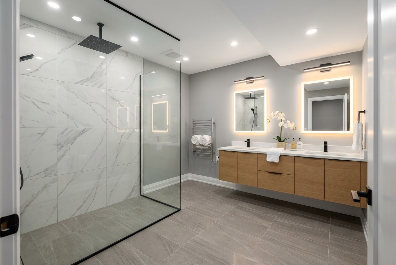 Luxury basement bathroom with heated floor, curbless shower, and spa-style lighting