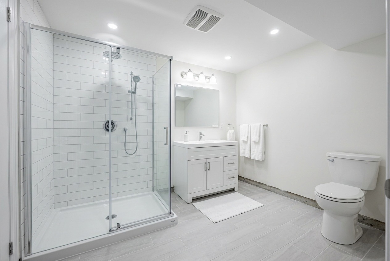 Modern basement bathroom installation in Richmond Hill by RenoEthics